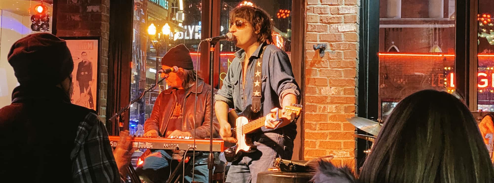 bar singer on guitar in Tallahassee