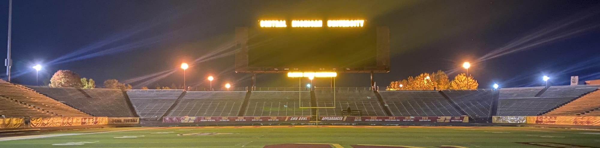 empty football stadium at night under the lights Tallahassee