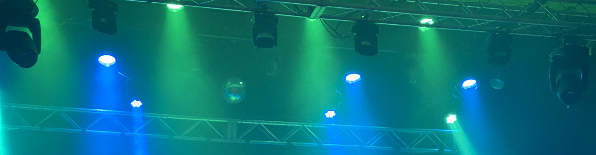 blue and green theater stage lights Tallahassee